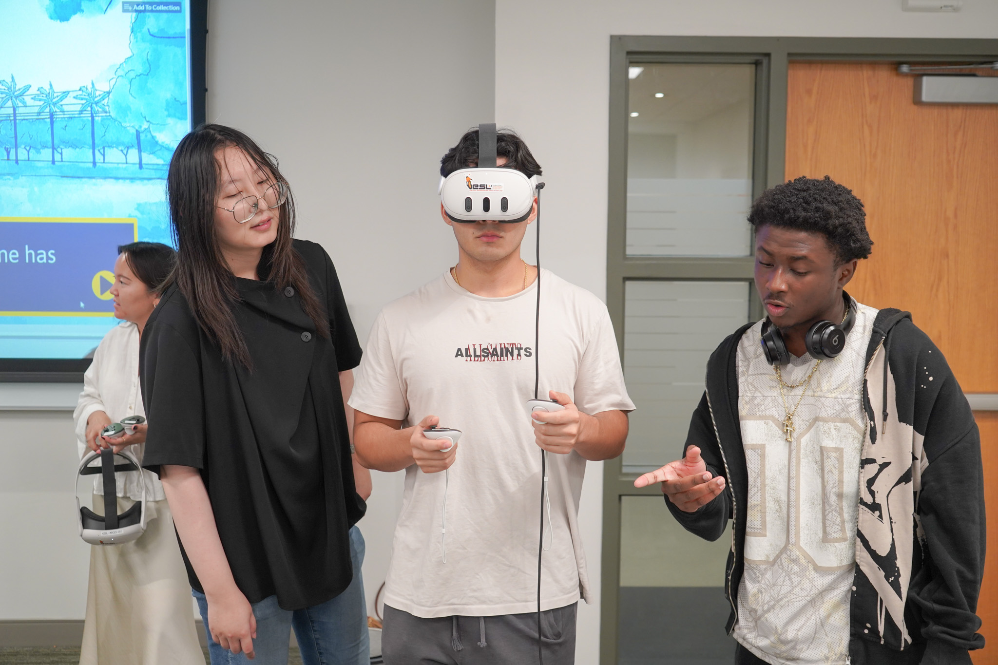 Player focused on a game screen at the arcade