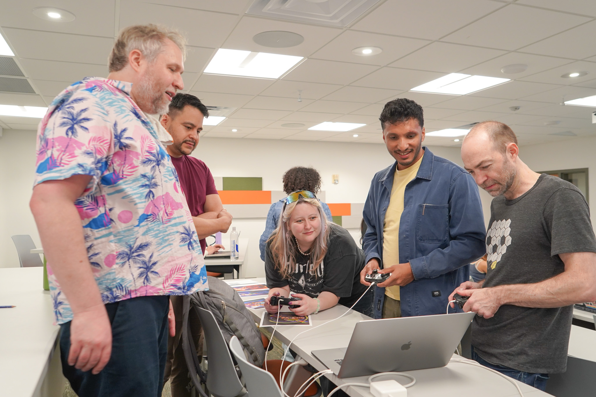 Students moving between game stations