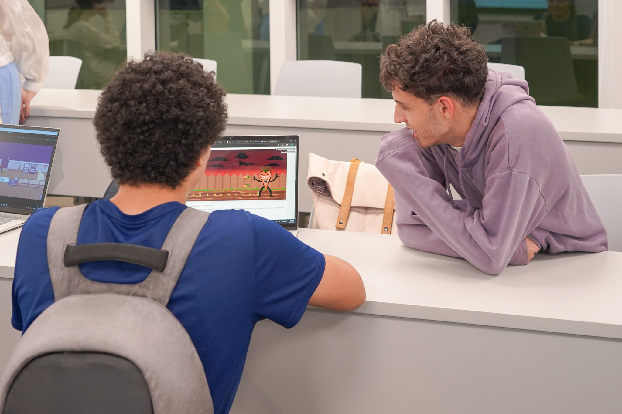 Playtesting area filled with people